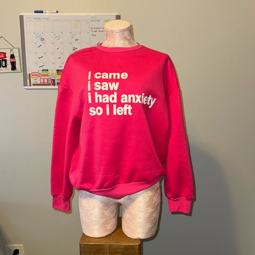 Pink crew neck on size small.  Never worn